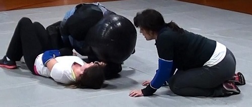 woman-ground-self-defense